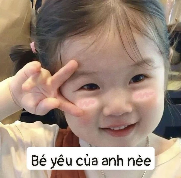 meme em bé cười đáng yêu